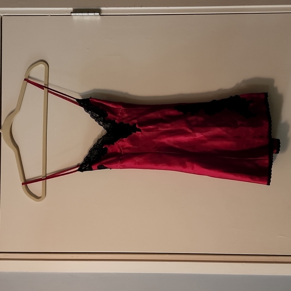Red satin slip with black lace trim